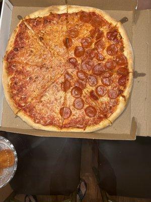 Half cheese, half pepperoni pie. XL