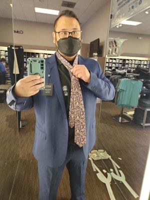 Trying on a floral tie to match my GF's dress