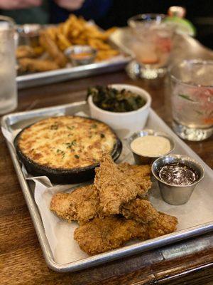 3 piece chicken tenders with tomato pie, collards, ranch and candied bacon sauces. Soooo good