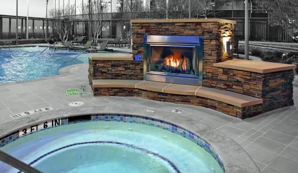 Outdoor Fireplace by the pool