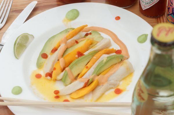 CDM's carpaccio ceviche: slices of freshly marinated mahi mahi, mango and avacado drizzles with CDM's signature carpaccio sauce.