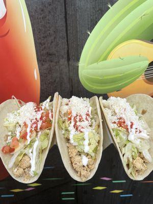 Chicken OMG Tacos - custom made to order, the set of 3 tacos comes with diced chicken, lettuce, tomatoes, fresco cheese, and sour cream.