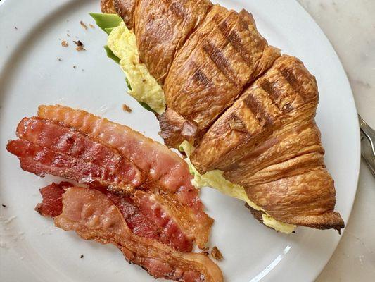 Avocado Toast on croissant, side bacon