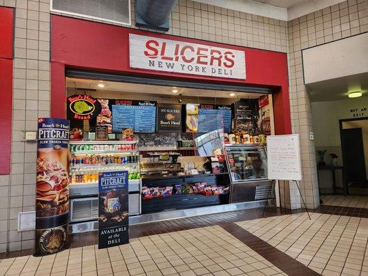 Front of the deli in the food court.