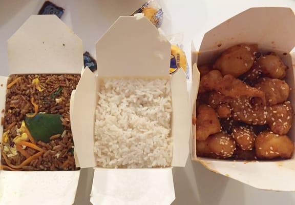 Vegetable fried rice with fresh green pepper and broccoli, white rice, and the sesame chicken! All fresh!