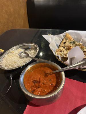 Butter Chicken with garlic naan bread.