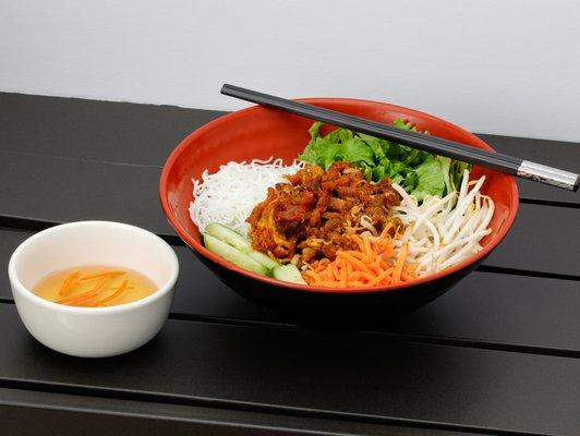 Pork Vermicelli Noodle Bowl (Bún Thịt Nướng) with bean sprouts, pickled carrtos, lettuce, cumber, and fish sauce