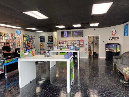 Inside the store... walk-to-tables for 1-on-1 tech service, sofas, Wi-Fi and an aquarium.