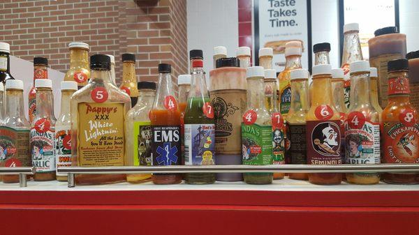 Lots of hot sauce numbered 1 - 10. 10 being the hottest.