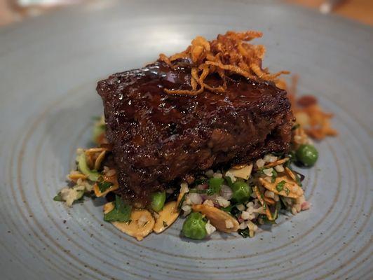 Braised lamb: green tabouli, crispy shallot, toasted almonds, 06/16/2023