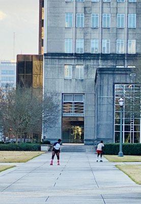 Two roller skaters having so much fun. Downtown Baton Rouge.