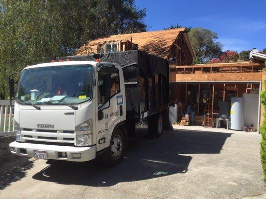 We demolished this entire garage and upstairs area in Corte Madera