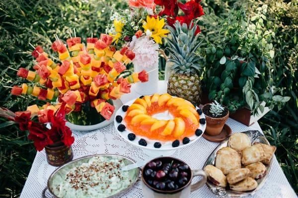 70's-inspired dessert display by Together Events. Photo by Natalie Jane Photography and hand pies made by Just a Dash Cakes.