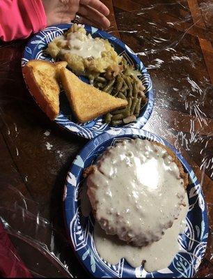 Chicken fried steak, potatoes, green beans, and toast!