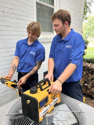 Our techs doing an HVAC inspection.