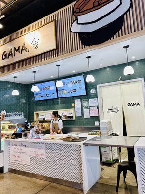 Gama is located next to Giovanni's.