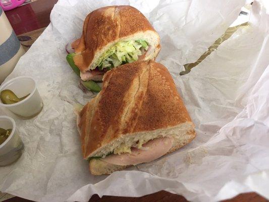 Turkey and white cheese with basic veggies. Pressed toasted panini style. Pretty darn good.