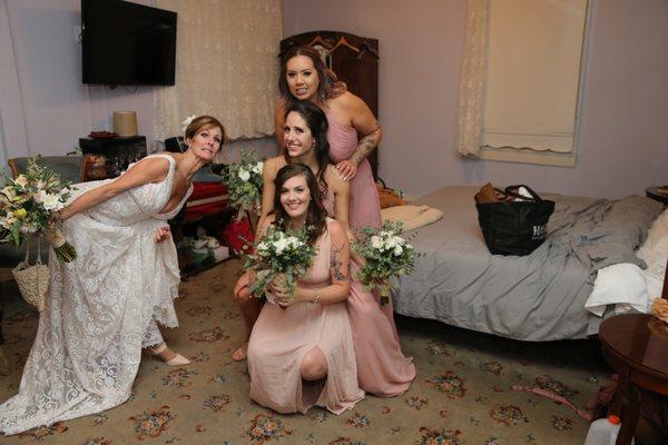 Bride and bridesmaids getting ready