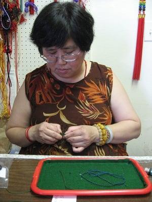 Helen doing Chinese knotting