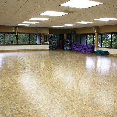 Spacious GROUP EXERCISE rooms. Over 50 classes a week: Yoga, Zumba, Pilates, Muscle, Cardio, Qigong, Dance, & more!