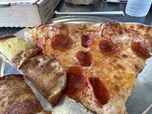 Cheese and pepperoni with bread sticks