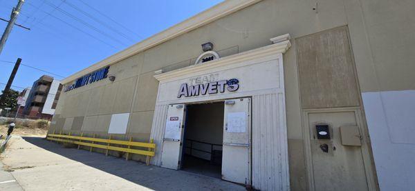 Entrance to store, meter parking in front