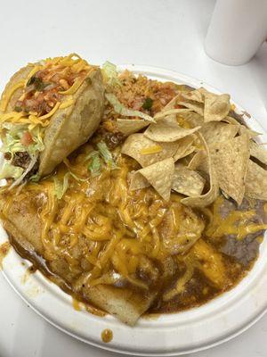 Enchilada plate.  2 enchiladas 1 puffy taco, rice and beans and chips.