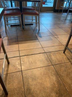 You can see footprints in the grease on the tiles.