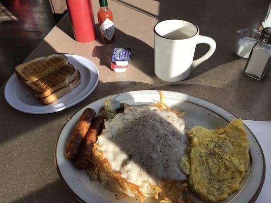 egg,potatoes,gravy, sausage links,toast