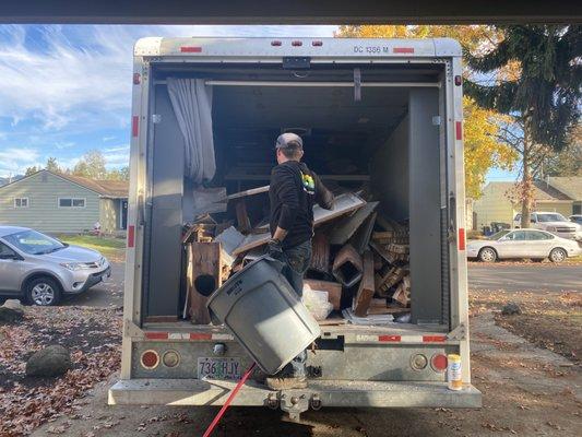 Jon is packing the Mighty Junk Truck carefully. This is a big job but we are going to make it in one load.