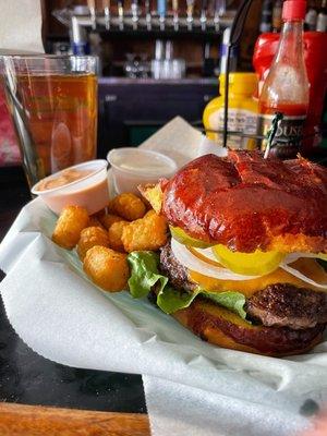 BYO Burger with lettuce, tomatoes, onion and thousand island.