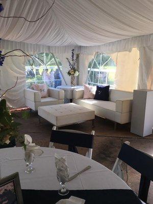 white leather furniture available in our event tent for your wedding