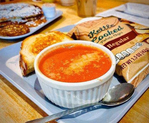 Soup and sandwich combo (grilled cheese sandwich and creamy tomato soup)