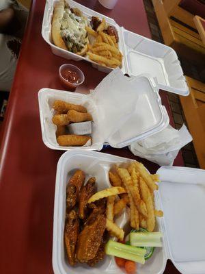 Gold wing combo and Philly sandwich combo with cheese sticks