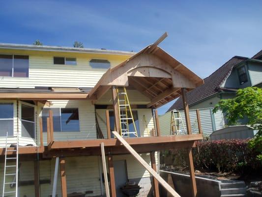 Add a captio2nd story deck.. with concrete steps and azek pvc decking... this deck turned out incredible