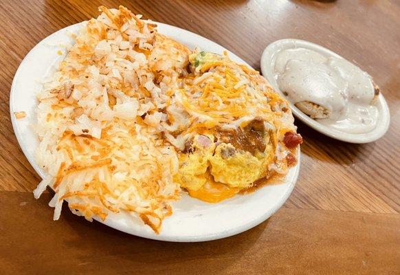 Daddy of them all omelette with a side of biscuits and gravy