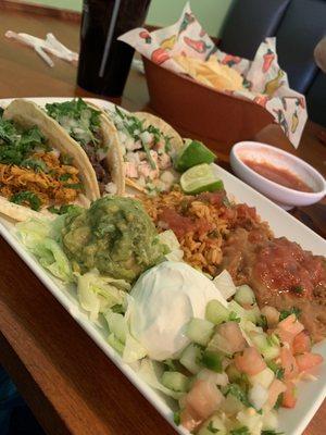 Three tacos and fixings