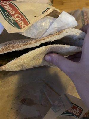 Here's my veggie pita pocket... it's mostly just pita. Normally so full veggies burst out. Regret tipping driver for this bs