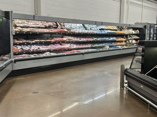 Look how beautifully stocked this meat case is in the early morning.