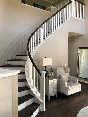 Before: stairs don't look finished so I asked Summit to come in and add baseboards to the stair case.