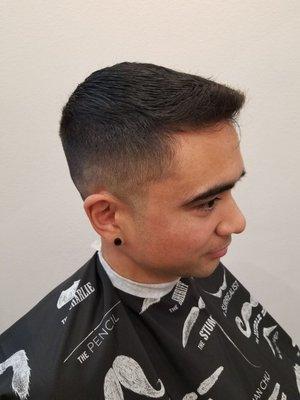 Zero low fade with a two finger length on top.