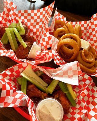 10 wingers with traditional and atomic sauces and a side of onion rings