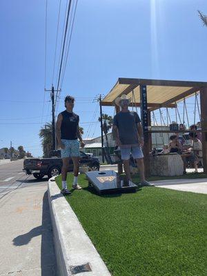 Our group enjoying the cornhole boards