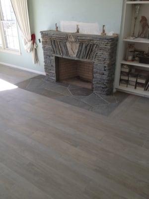 Remodelled fireplace and tile floor