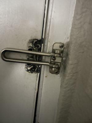 Broken internal door security bolt.