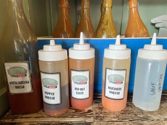 Wide variety of sauces: North Carolina vinegar, pepper vinegar, red hot sauce, habanero vinegar, etc.