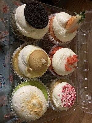 Cupcake heaven! Key lime, Banana Pudding, Oreo, strawberry, red velvet, and vanilla with sprinkles