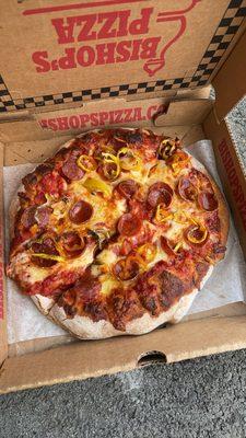 Pepporoni pizza with banana peppers