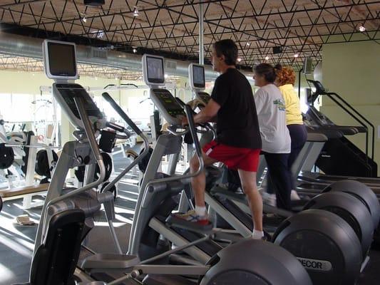 All of our cardio equipment have their own LCD TV's so you can watch whatever you want.