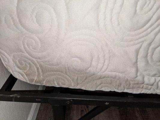 Soiled mattress. Not sure how since I had my mattress in a mattress bag. This company does not know what they're doing